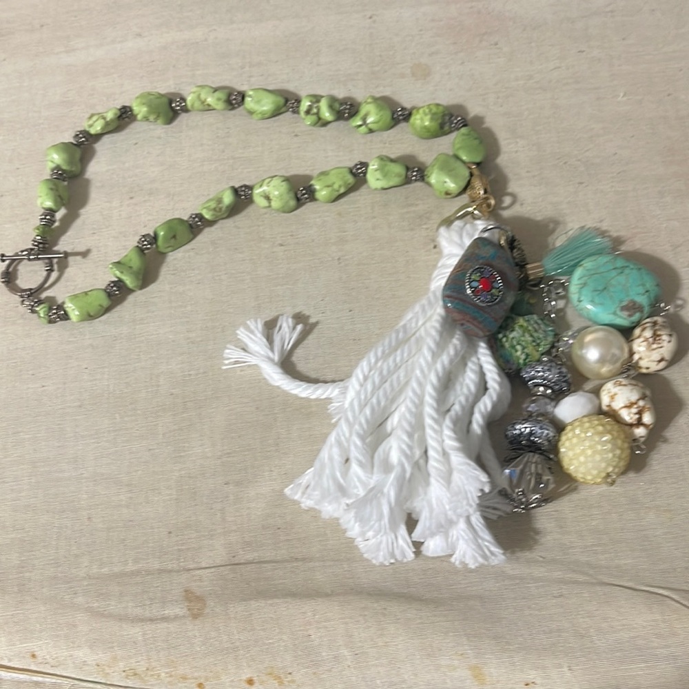 Religious beaded cross necklace.